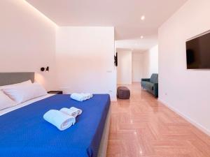 Katil atau katil-katil dalam bilik di Apollo Suites