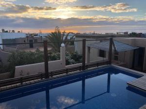 a swimming pool on the roof of a building at Villa Azal in Mirleft