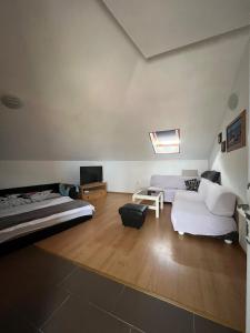 a living room with two beds and a couch at Lydia in Vrsi