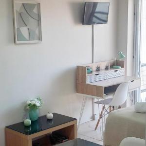 a room with a desk and a bed and a table at Studio Nicki Chania in Chania