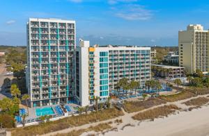 an aerial view of two tall buildings next to the beach at Captain's Quarters Resort in Myrtle Beach +33 photos