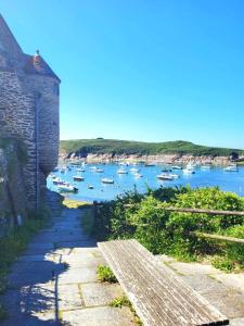 a view of a river with boats in it at Résidence de la Presqu'île in Plougonvelin