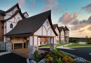 a rendering of the front of a resort building at Dellshire Resort in Wisconsin Dells