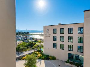 a view of the sanyo hotel with a marina in the background at Safin Hotel & Spa in Vlorë
