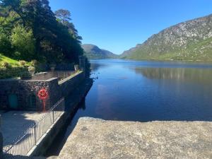 a view of a lake with mountains in the background at Cope House Rooms in Killybegs