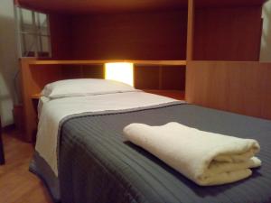 Postel nebo postele na pokoji v ubytování Relais Villa Lézard