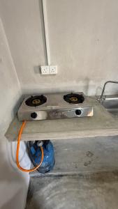 two stove tops on a counter in a room at Holabay Surf Hostel in Arugam Bay +50 photos