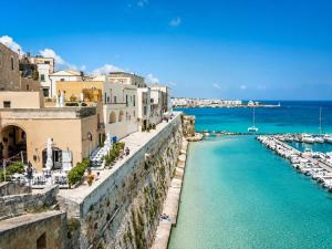 a view of a harbor with boats in the water at Sunrise Apartment by Symphonya Luxury Holiday Rentals in Otranto