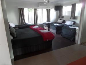 Postel nebo postele na pokoji v ubytování Motel Oasis