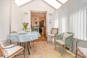 a dining room with a table and chairs at 2 Bed in Richards Castle oc-r45225 in Lane to Richards Castle