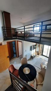 a view of a living room with a loft at Elegant appartement in Hammam Sousse