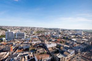 an aerial view of a city with buildings at Apto w/ A/C in Anápolis Downtown GRLB1802 in Anápolis