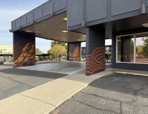a building withazes on the side of it at The Wesley Boutique Hotel Page, AZ in Page