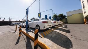 a row of cars parked in a parking lot at Holiday Inn Orizaba by IHG in Orizaba +112 photos