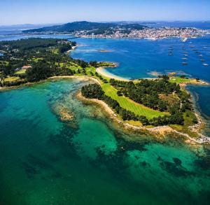 an aerial view of an island in the water at Apartamento As Caldelas in O Grove