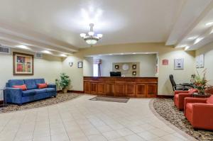 a lobby with couches and a waiting room at Super 8 by Wyndham Great Bend in Great Bend