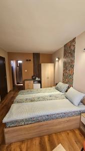 a bedroom with a large bed in a room at D House in Chernomorets +38 photos