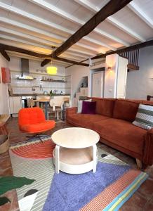 a living room with a couch and a table at Casita Drago in Santa Cruz de la Palma