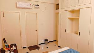 a room with a door and a room with a room at Sivam Villa-Kovalam in Covelong +110 photos