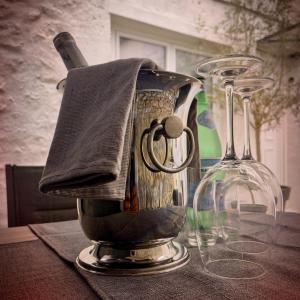 a glass blender sitting on top of a table at Cozy loft, Loire et chateaux in Messas