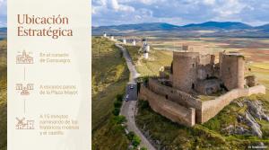 a book with a picture of a castle on a hill at Ocre y Cal in Consuegra