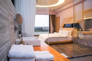 Krevet ili kreveti u jedinici u okviru objekta Sunny Stream B & B