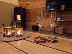 two wine glasses sitting on top of a table at Terra Serena in Frasnes-lez-Anvaing