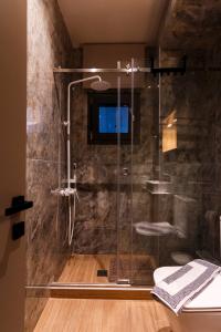 a shower with a glass door in a bathroom at CASA UNO Horizon in Platamonas +35 photos