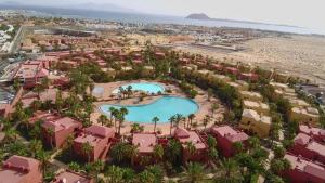 an aerial view of a resort with a pool at NEW CASA BLU - Oasis Tamarindo 1 in Corralejo