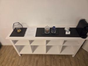 a white table with three bowls on top of it at Bonn Lounge in Bonn