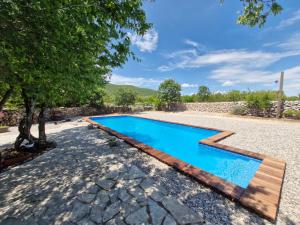 an image of a swimming pool in a yard at Etno vila Međugorje in Čapljina