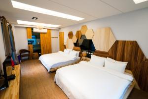 Krevet ili kreveti u jedinici u okviru objekta Sunny Stream B & B