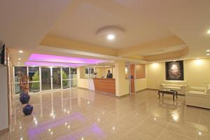 The lobby or reception area at Arra Grande Suites - Nearest Airport Hotels Bangalore