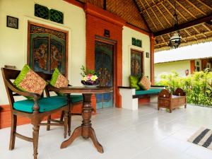 
A seating area at Taman Sari Bali Resort and Spa
