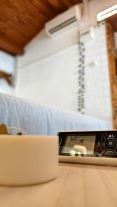 a laptop sitting on top of a wooden table at Cozy studio in medieval town in Le Val