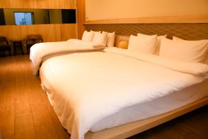 Krevet ili kreveti u jedinici u okviru objekta Sunny Stream B & B