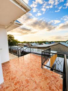 a balcony with a view of the water at Nanaa Hotel in Nungwi