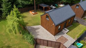 an overhead view of a house with a yard at Chëczka - 2min do Jeziora in Zbychowo