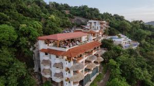 an aerial view of a hotel on a mountain at Pacífica Grand Zihuatanejo in Zihuatanejo