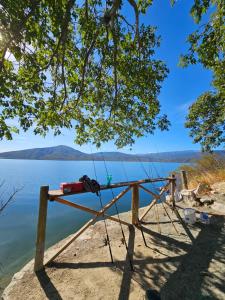 a stand on the side of a lake at Velas del Lago in Piedras Moradas +5 photos