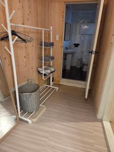 a room with a bathroom with a toilet and a sink at Moomoo House in Busan