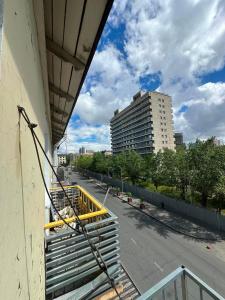 a view of an empty street from a building at Russian Embassy Apartment in Ulaanbaatar +1 photo