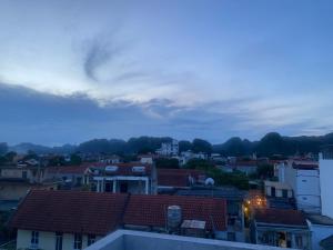 a view of a city at dusk at Viet Anh Homestay in Ninh Binh