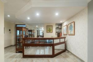 a large room with a counter in the middle at RedDoorz near Gubeng Station Surabaya in Bagongpatar