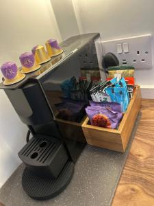 a food slicer with a box of food at Bromielaw Room Only Accommodation in Seahouses