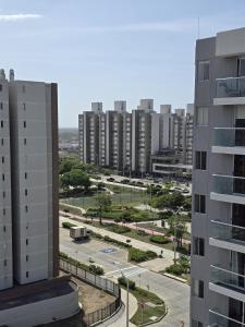 a view of a city with tall buildings at Loft type apartment premium style with pool in Barranquilla