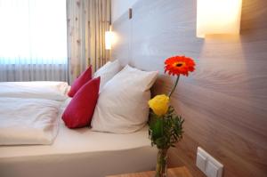 Postel nebo postele na pokoji v ubytování Hotel Schützenburg