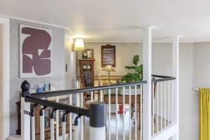 a living room with a staircase and a living room with at Young Stay in Seoul