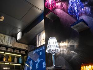 two wine glasses hanging from a wall in a bar at grandir ｸﾞﾗﾝﾃﾞｨｰﾙ -Adult Only- in Yokohama