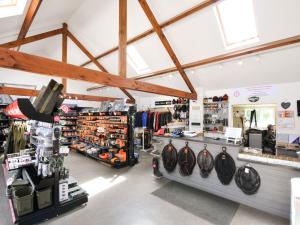a store with a lot of products on display at Maple in Winkleigh